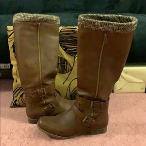 Brown boots under the knee